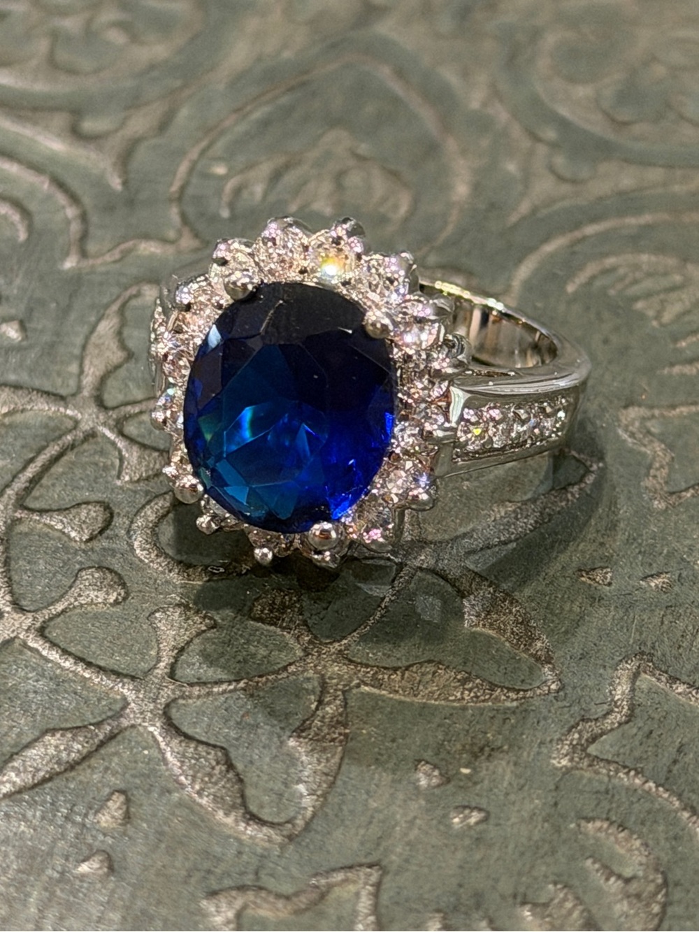 New ViVI Silver Ring with Deep Blue Oval Center and Clear Halo